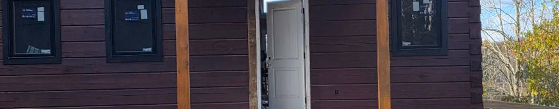 Front entry of a newly restored log home